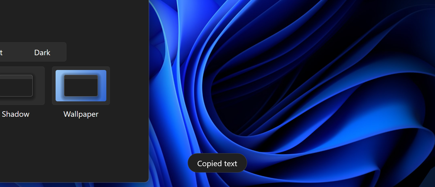 The Notice “Copied text” on the Bloom wallpaper, beside the edge of Zilum's Settings window.
